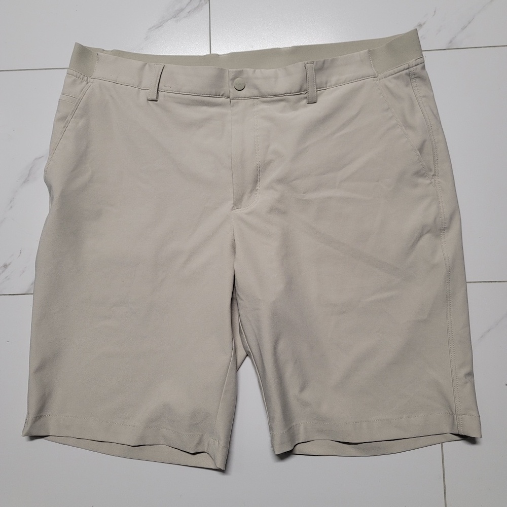 mens greg norman khaki shorts - athletic feel material